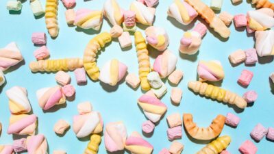 Bright and whimsical arrangement of candies, perfect for sweet cravings and fun backgrounds.