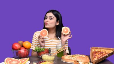 a woman eating a fruit