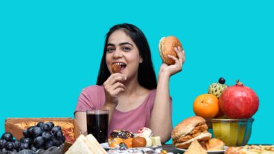 a woman eating a sandwich