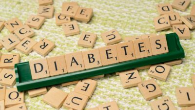 Close-up of Scrabble tiles spelling 'diabetes', highlighting awareness and education.
