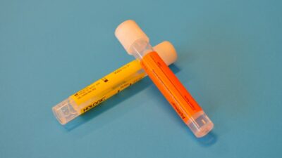clear plastic tube on blue surface