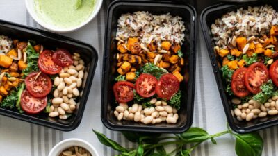 a group of trays with food