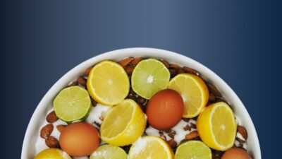 sliced orange fruits in white ceramic bowl