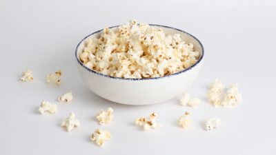 white popcorn in white ceramic bowl