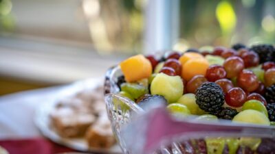 Vibrant fresh fruit salad in a crystal bowl, perfect for a healthy snack.