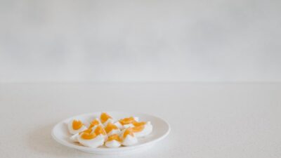 sliced fruit on white ceramic plate