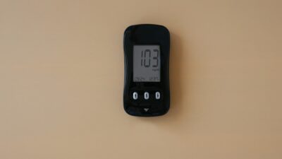 a digital clock mounted to the side of a wall