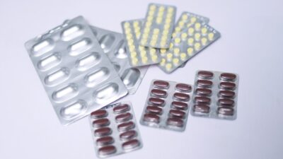 yellow and red medication pill blister pack