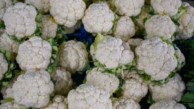 a bunch of cauliflower is piled on top of each other